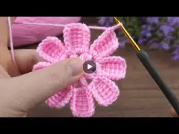 crochet and tunic stitch together... how to make a magnificent crocheted flower