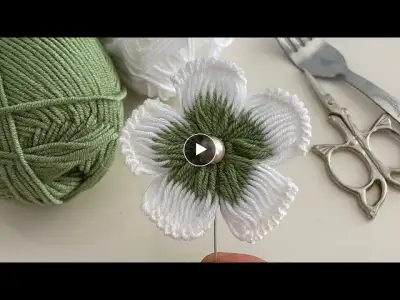 You will love this knitted flower I made on a fork.
